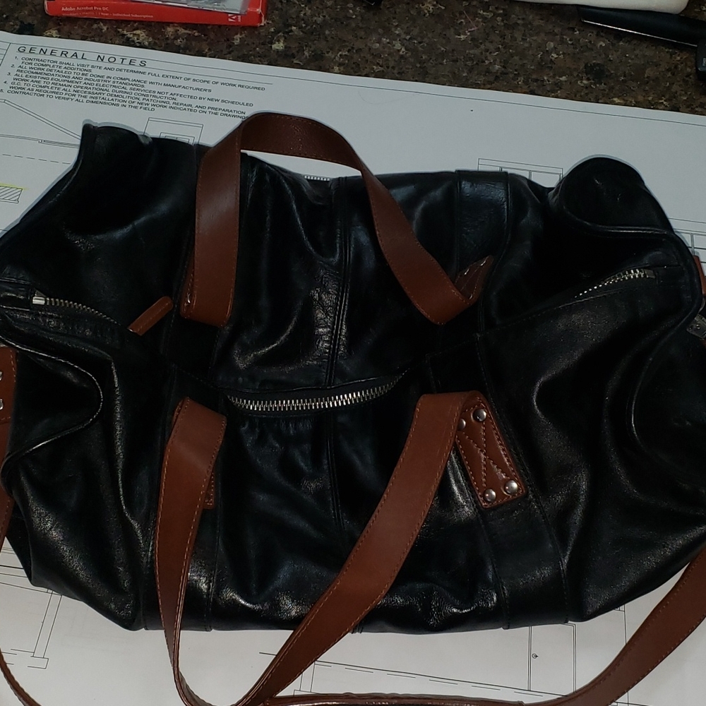 Red Envelope Black Leather Duffle Bag